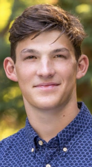 Boy standing for a headshot